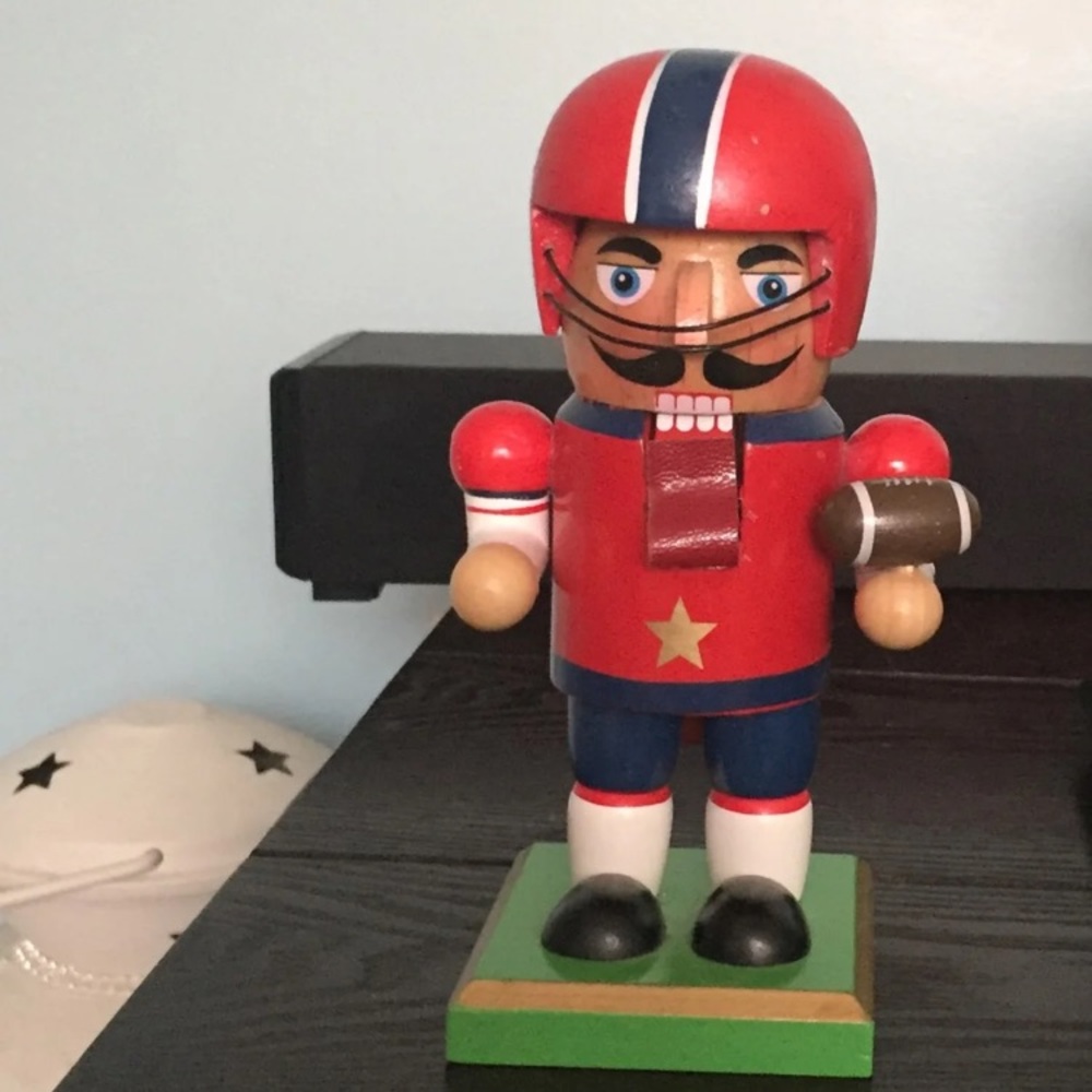 Nutcracker footballer 6 1/2inches by 3 inches.